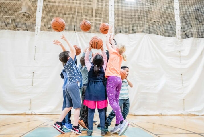 Kids playing basketball.