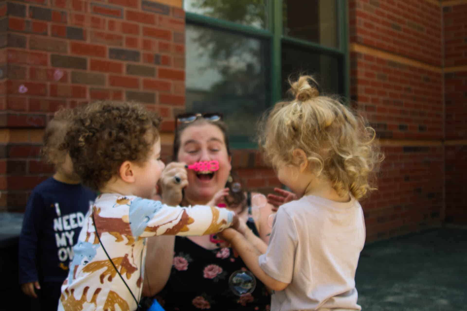 Brookline Early Learning Center kids and teacher.