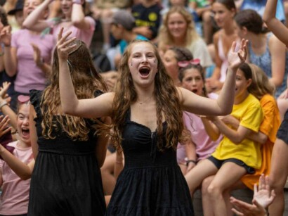 Girl in a crowd at Camp Grossman.