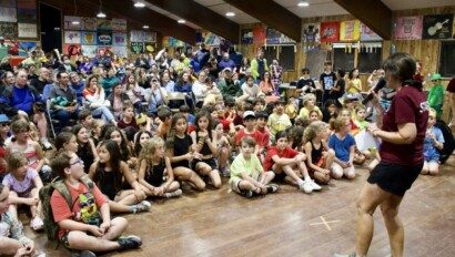 Kids indoors at a special event at Camp Grossman.