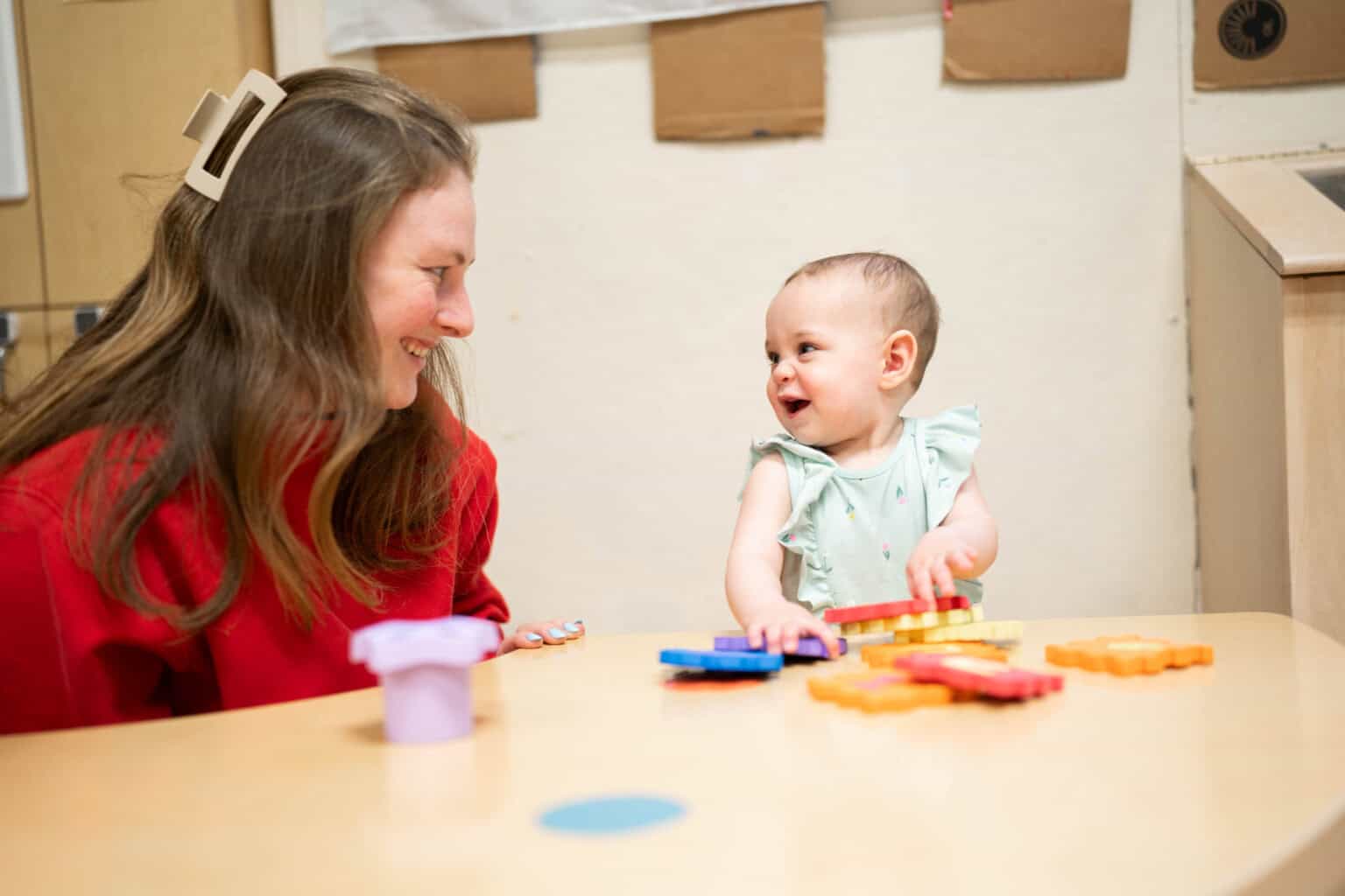Photo of child and teacher.