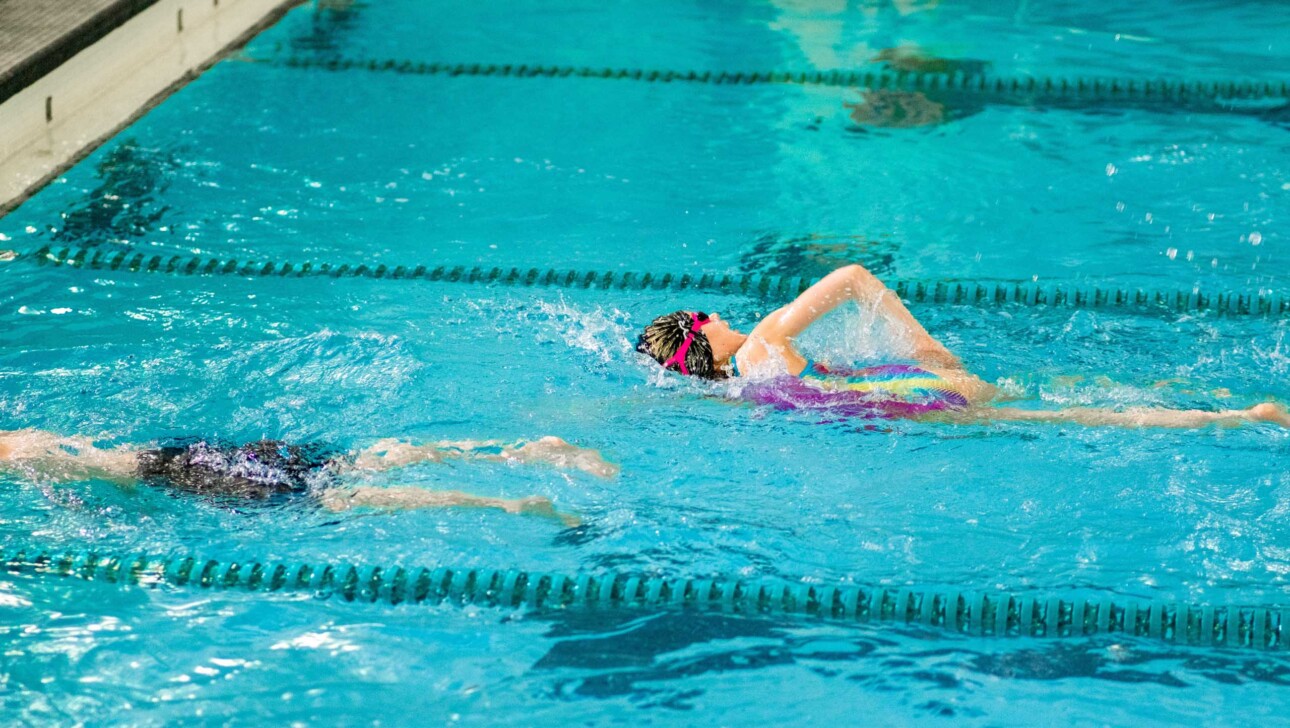 Campers swimming.