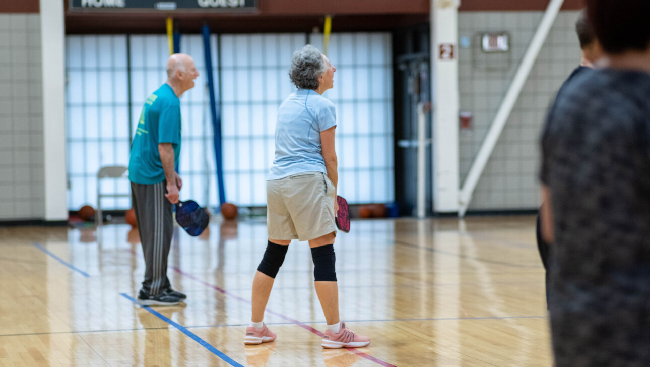 People playing pickleball.