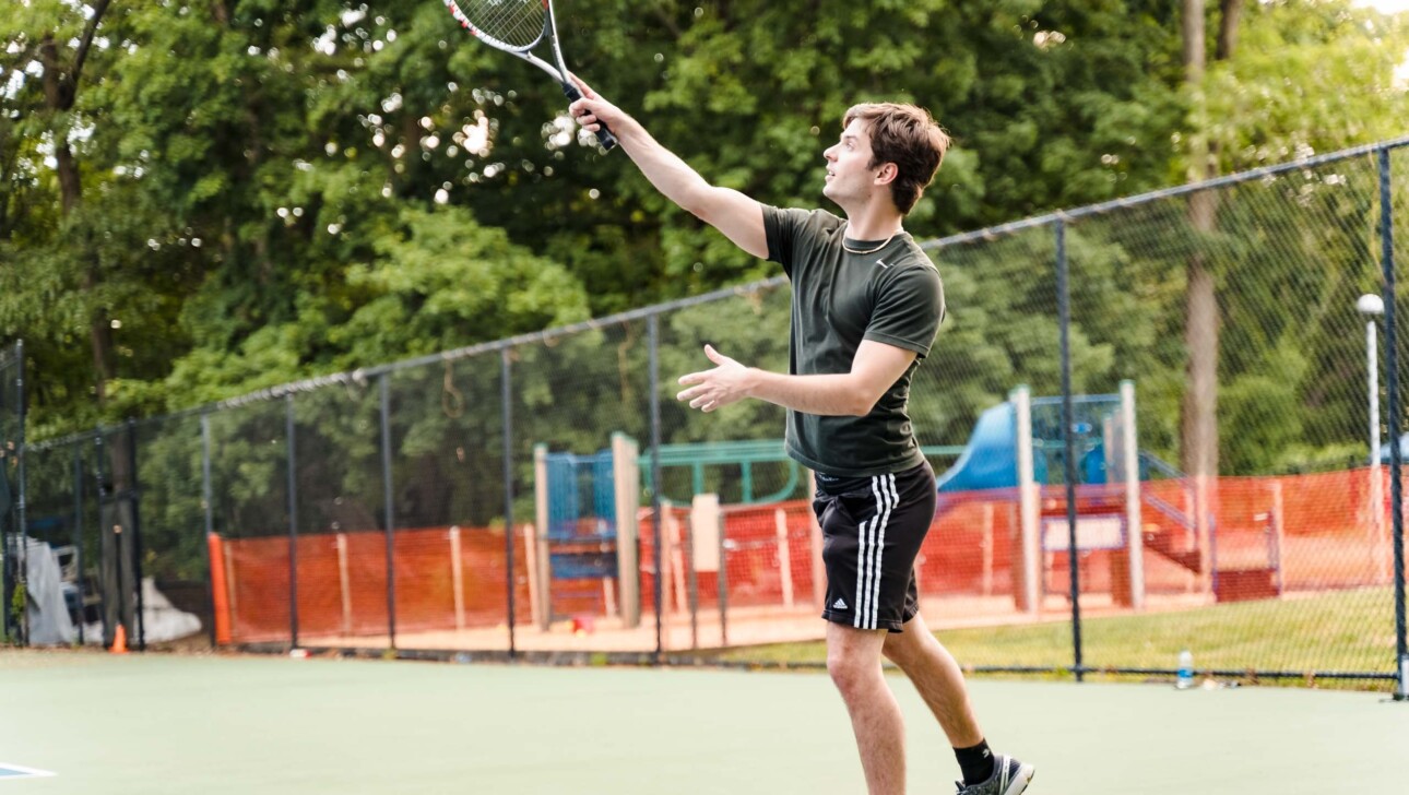 A man playing tennis.