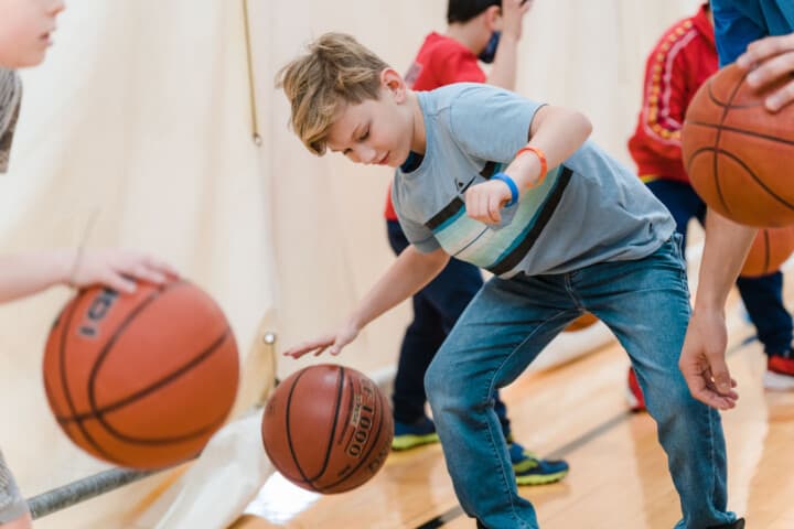 Boy playing basketball.