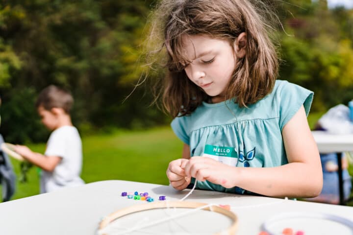 Girl doing a craft.
