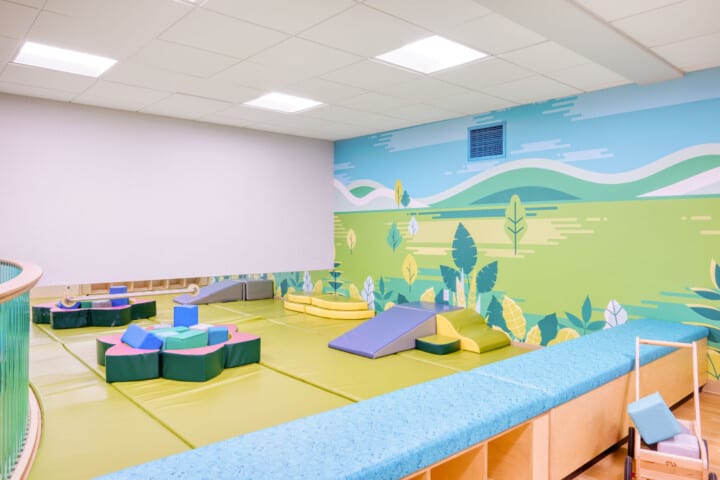 Infant play area with soft pads.