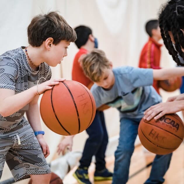 Boys playing basketball.