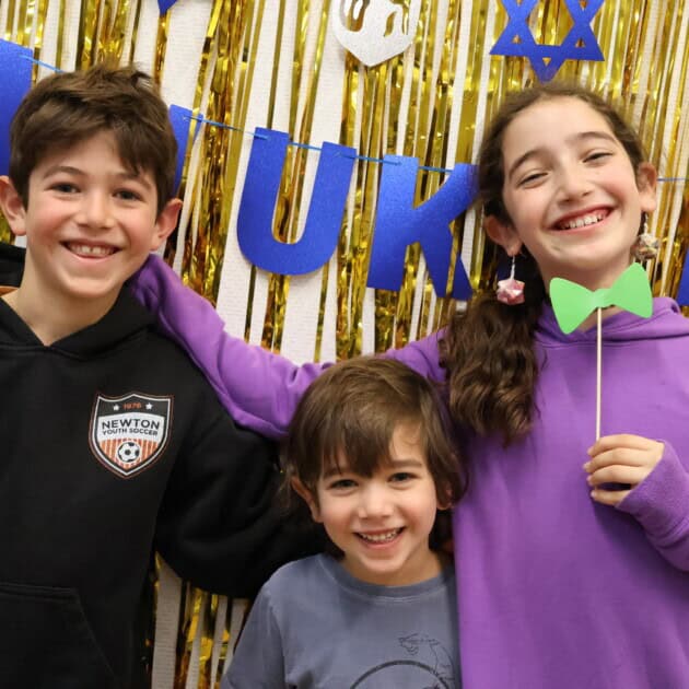 Family at the Discovery Club Chanukah Party.