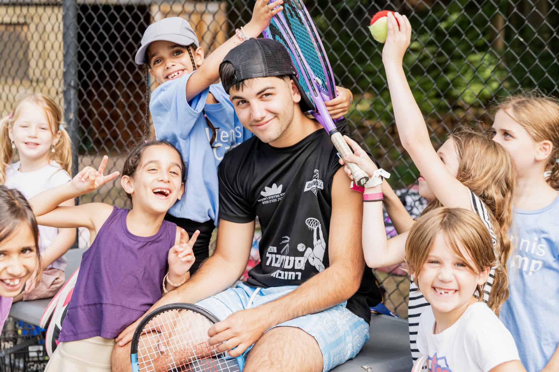 Counselors and kids at Tennis Camp.