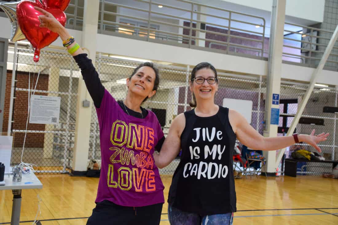 Instructors smiling together at the Zumbathon.