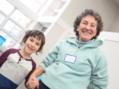 Grandparent and child at PJ Library Grandparents Challah Bake.
