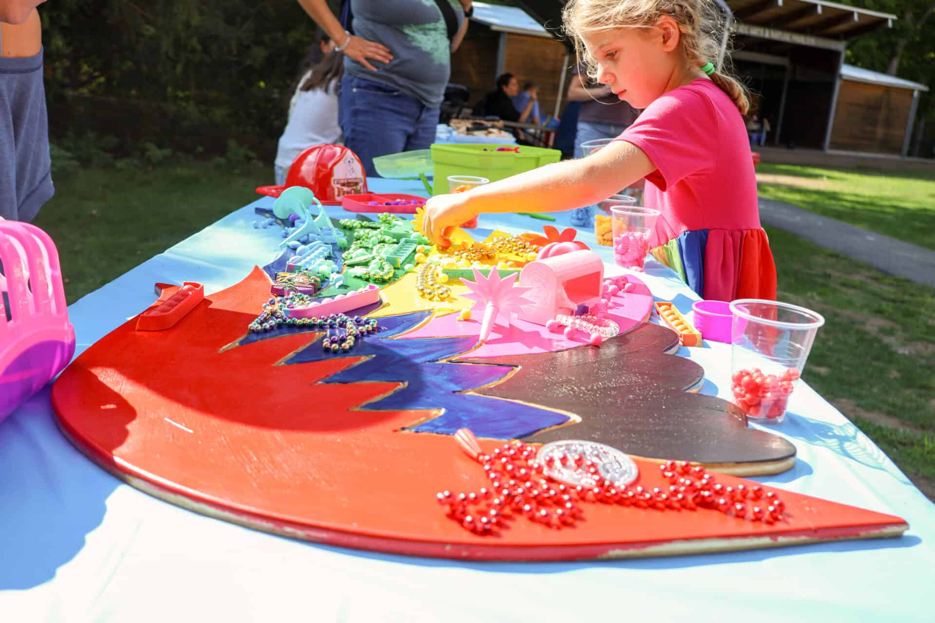 Girl working on the Wings of Hope.