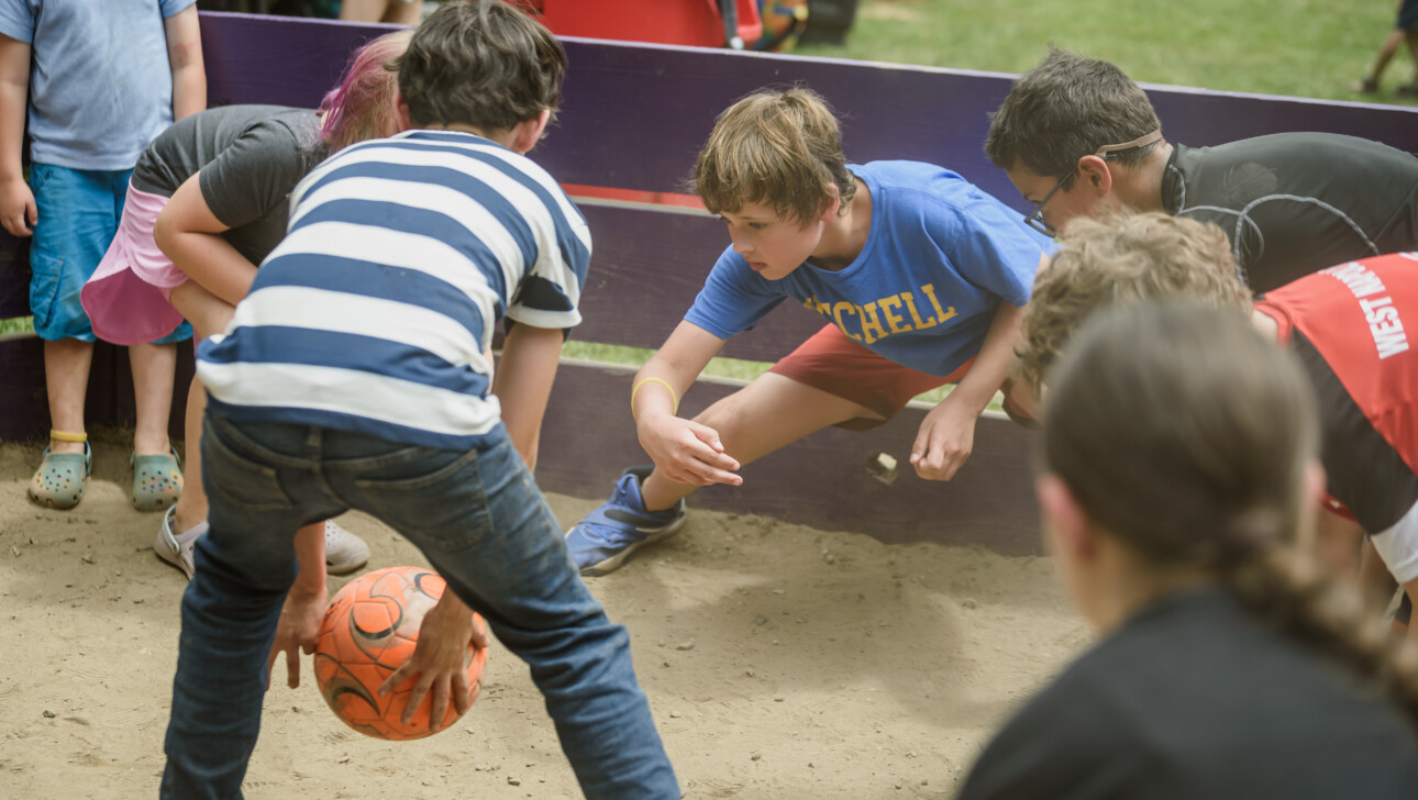 Kids playing gaga at camp.