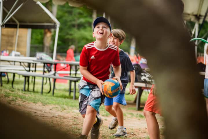 Kids playing outside at camp.