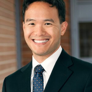 Headshot of Aaron Tang.