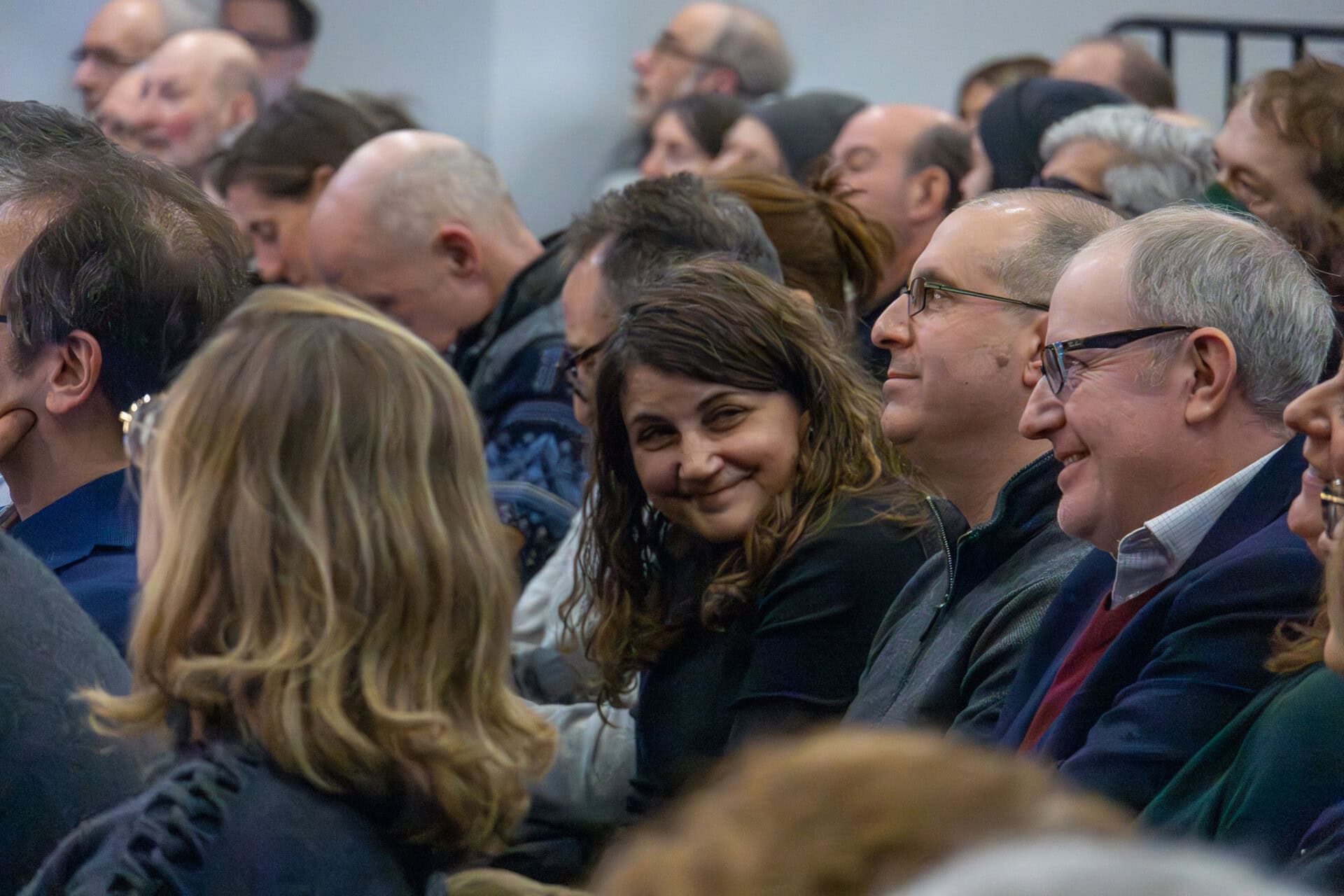 Attendees sitting in the Theater.