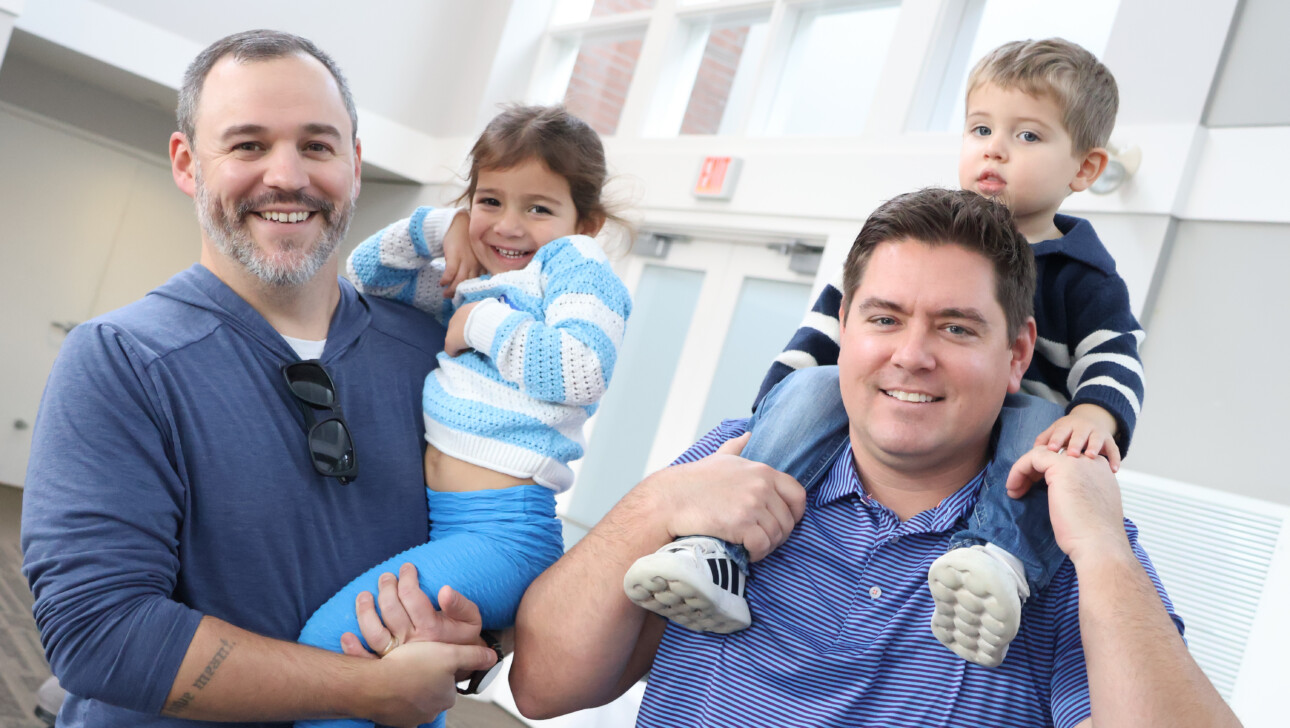 Dads and children at a Welcome Baby event.