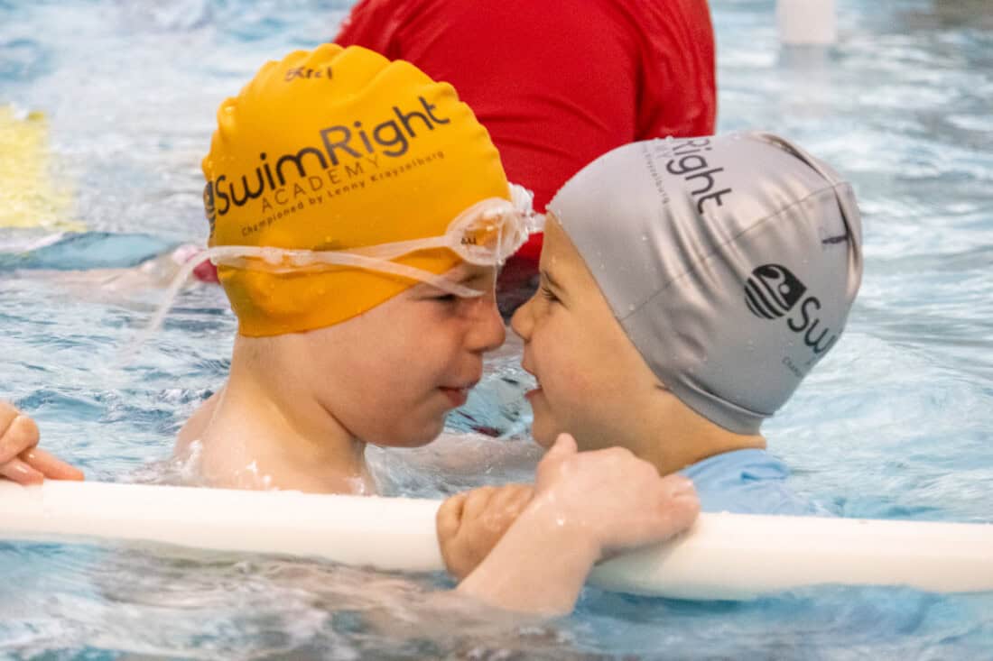 Kids playing with each other at a Swim Intensive.